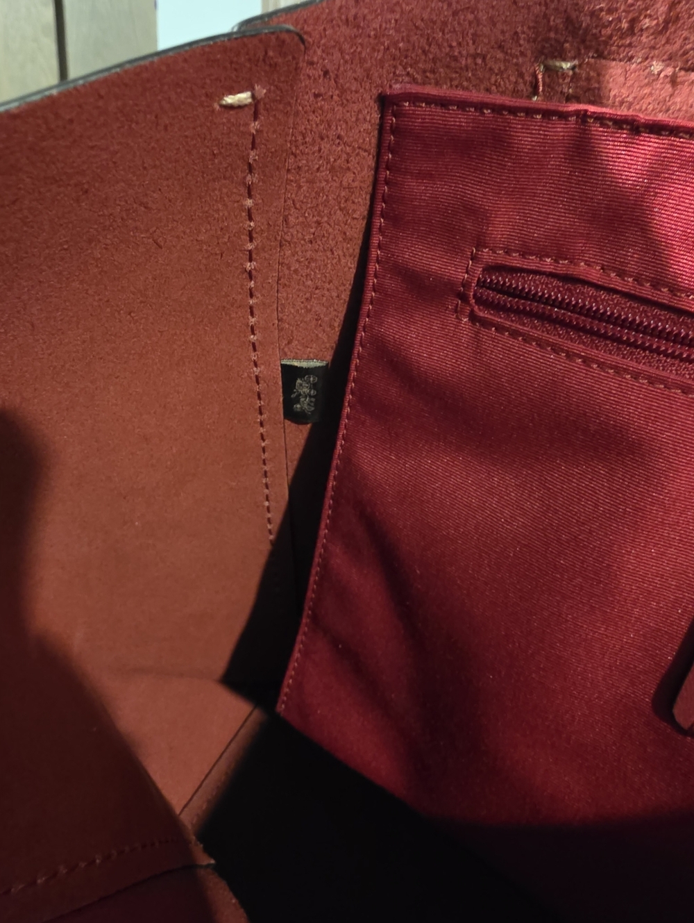 Coach Derby Tote Bag in black pebbled leather with a contrasting red interior. - Picture 10 of 11